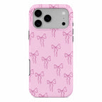 Pink dual-layer phone case with bows